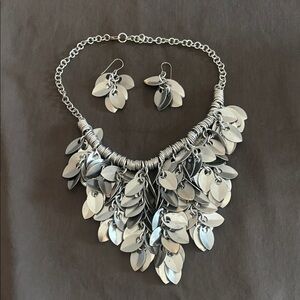 Unique metal necklace and earring set.